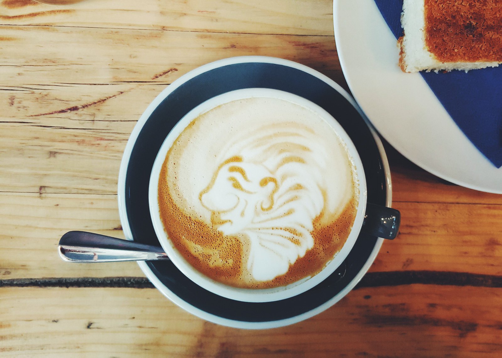 cappuccino art Monks Coffee Roasters