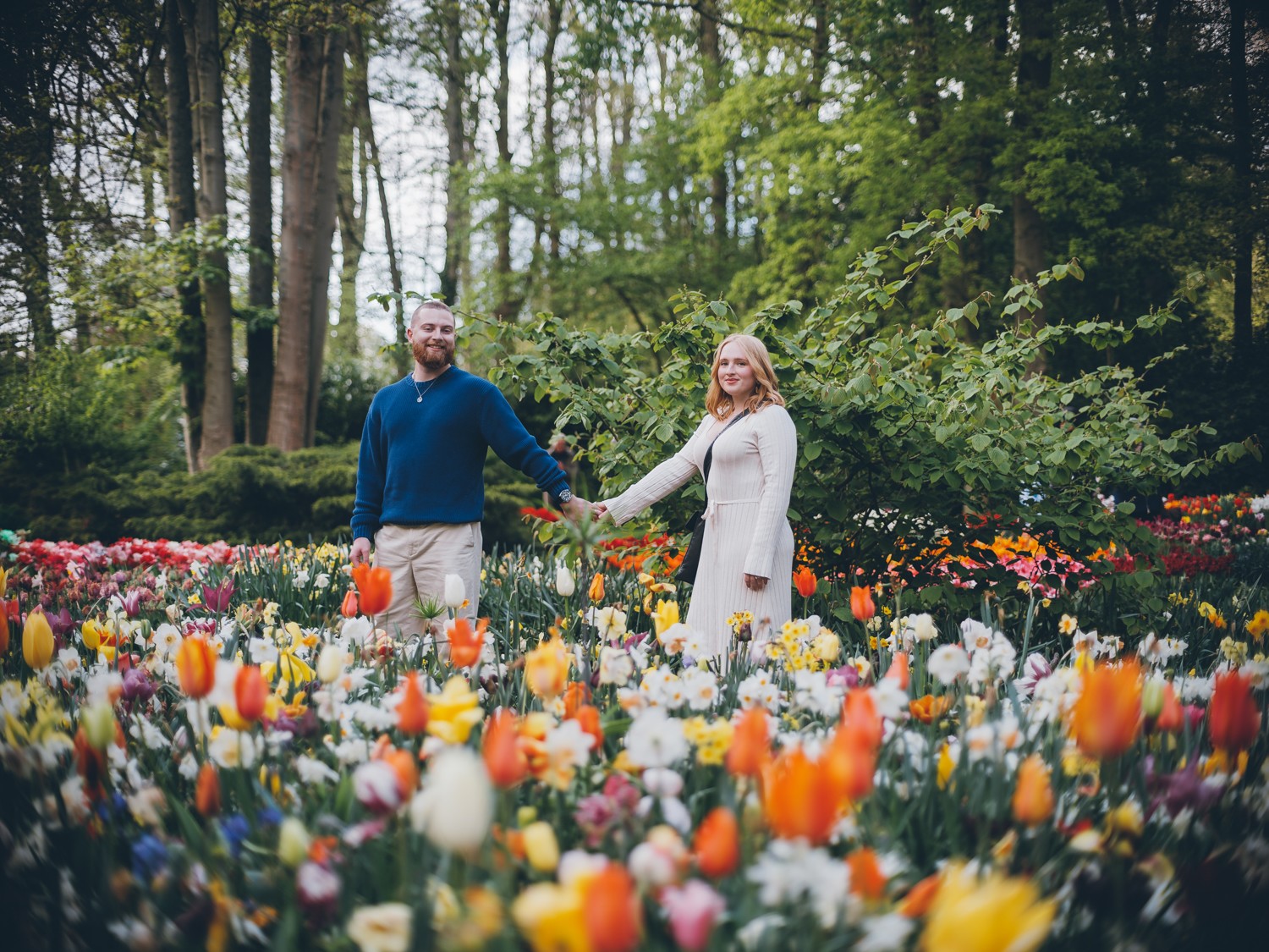 Expressive Couple Pictures in Blooming Tulip Fields