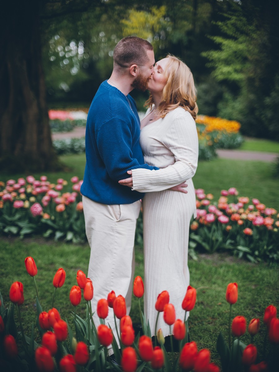 Candid Couple Photoshoot Among Blooming Tulips