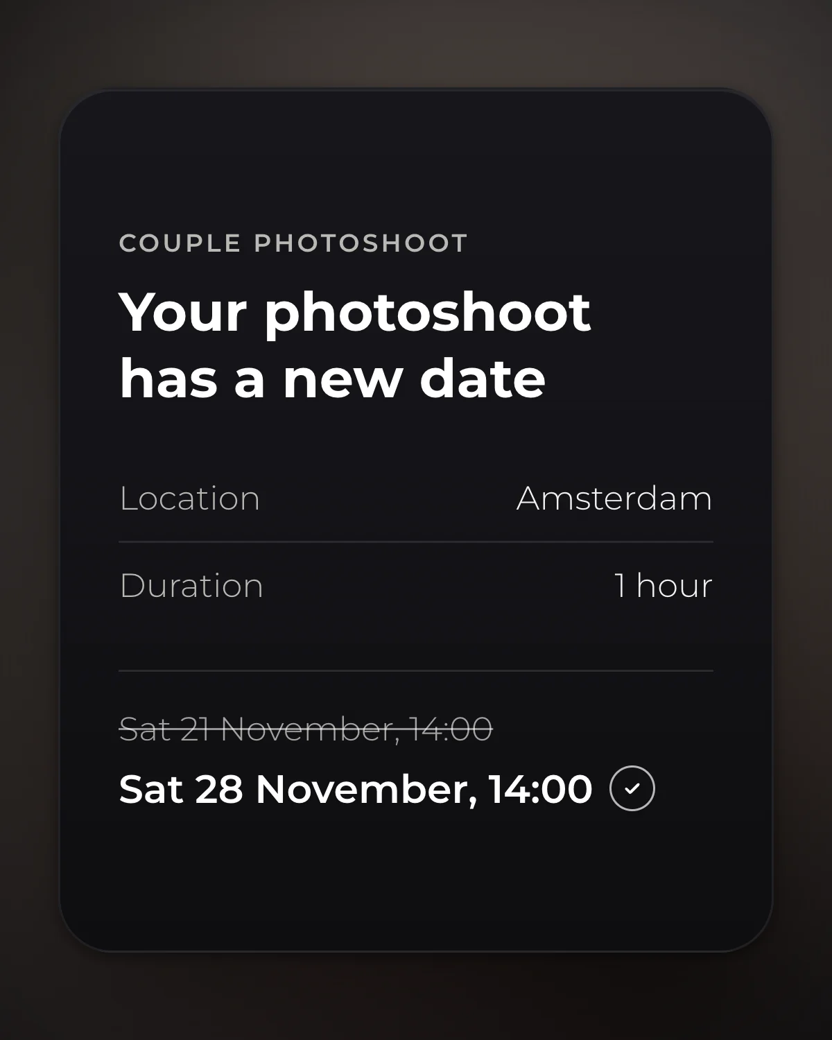 Card for a Couple Photoshoot saying Your photoshoot has a new date, with location Amsterdam, one hour, and Sat 21 November crossed out above Sat 28 November